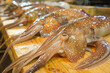 © MVProductions - nice fresh squid on a fish market