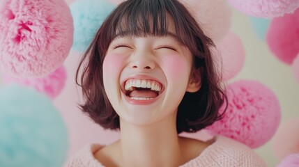 A candid shot of a cute Japanese model laughing with joy, surrounded by soft pastel-colored props