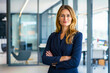 © MVProductions - Portrait of a powerful, proud and confident female executive businesswoman standing in a modern office