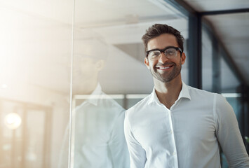 Fototapete - Businessman, portrait and happy at window with glasses, professional or pride for career development. Lawyer, employee or smile in office for ambition, case opportunity or space in workplace in Italy