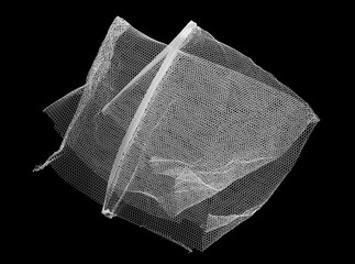 White plastic mosquito net, piece mesh isolated on black, clipping path