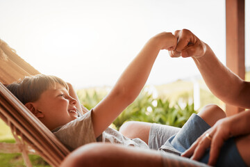 Wall Mural - Smile, child and fist bump with parent outdoor for family support, love and care on hammock. Boy, happy kid and hand gesture with person for connection, success and teaching sign at backyard together