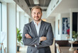 © f_bossa - A portrait headshot photo of a friendly professional CEO executive business worker
