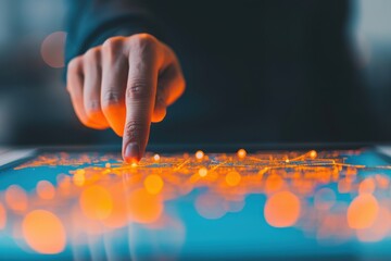 A hand touches a digital touchscreen displaying a glowing network of data points, symbolizing technology, innovation, and data interaction.