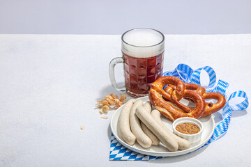 Wall Mural - Traditional Oktoberfest set. Pretzels, beer, weisswurst with mustard. German festival food concept