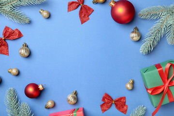 Poster - Flat lay composition with Christmas decor on blue background, space for text