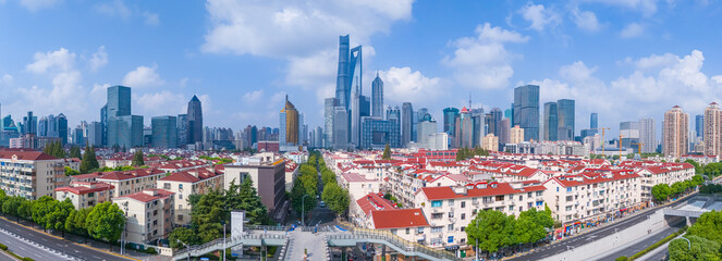 Aerial view of Shanghai Downtown skyline, highway roads or street in sunny day