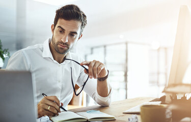 Aufkleber - Business, man and computer writing on notebook at office on website or online for research and information. Lens flare, male person and serious as employee with diary on internet as project manager