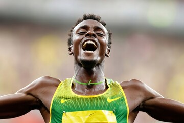 Triumphant Track Athlete Celebrating Victory at Outdoor Sporting Event