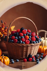 Wall Mural - autumn basket overflowing with a bright mix of juicy berries and blueberries, symbol of the fall harvest, on a warm, earthy background 