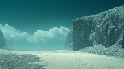 A desolate landscape with a large rock wall in the background