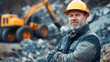 © Kowit - Male Technician in Hard Hat Promoting Industrial Safety in Quarry Setting