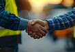 © Chich - Handshake Between Construction Workers