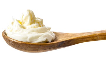 Poster - A wooden spoon filled with whipped cream on a white background, perfect for your dessert or cafe photography needs