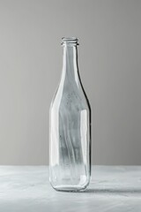 Poster - A glass bottle sits on a table, waiting to be used or admired