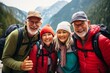 © Baba Images - Group portrait of senior friends enjoying hiking in mountains