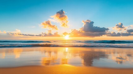 A breathtaking sunset paints the sky with vibrant hues as it sets over a tranquil sandy beach. The golden rays illuminate the gentle waves, creating sparkling reflections on the water and shore, symbo