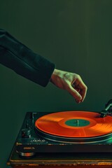 Poster - A person holds a needle and plays a vinyl record on a turntable