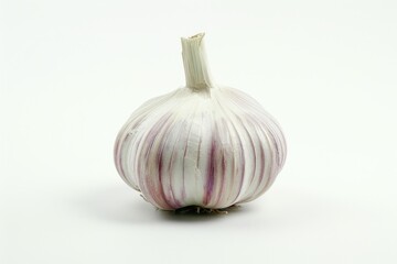 Poster - A close-up shot of a garlic bulb on a white surface, ideal for use in cooking or food-related projects