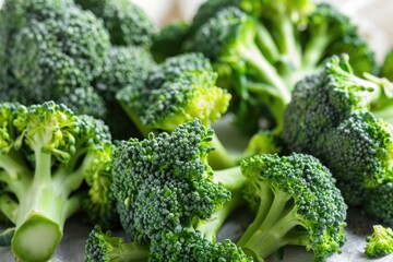 Poster - A pile of broccoli sits on a table, ready to be used in cooking