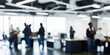 © Höyka Studio - Blurred view of open space office. Abstract office interior with office staff in it. High windows, office furniture in the frame, tables and chairs. Background, wallpaper for presentation