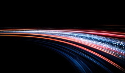 A long-exposure photograph of light trails on a black background, symbolizing fast digital data transfer in a network. 