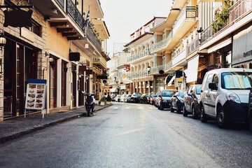 Naklejka na meble Vintage, street and buildings in city outdoor with architecture, travel path and history tourism of location. Urban, business and storefronts for traditional culture, holiday landmark and destination