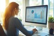© Nognapas - Adult businesswoman working at home using computer, studying business ideas on a pc screen on-line.