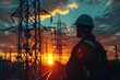 © Shweta - Silhouette electrician work on high ground heavy industry. Construction of the extension of high voltage in high voltage stations and rig