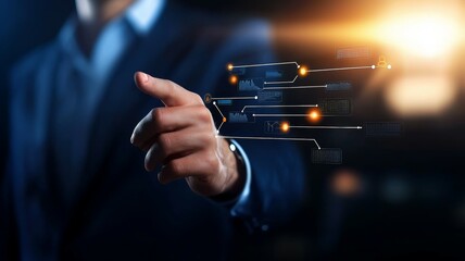 A man in a suit is pointing at a computer screen with a line of code