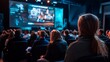 © atar - Audience watching a presentation or conference with a large screen showing a speaker or presentation