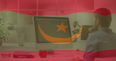 Poster - Flag image over person working on computer in modern office