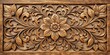 © Udomner - Intricate floral design carved on aged wood, wood carving, vintage, craftsmanship, pattern, flowers, textured