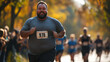 © Komkrit - An overweight man participating in a marathon, wearing a numbered bib and running alongside a group of other competitors, with cheering spectators on the sidelines