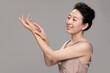 © Blue Jean Images - Studio Shot Of Beautiful Mature Woman