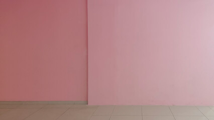 Poster - Inside，there is an empty pink wall and floor.