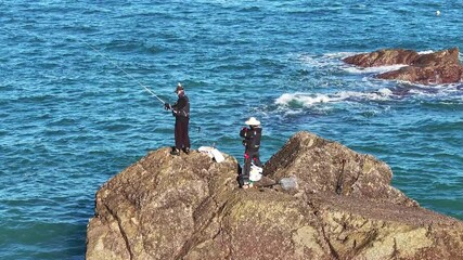 Sticker - man fishing on the beach