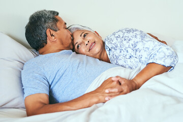 Poster - Relax, cuddle and senior couple in bed with kiss for love, support and marriage connection on weekend. Elderly people, happy and affection with smile at home for retirement romance, bonding and peace