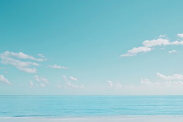 Wall Mural - serene soft blue sky and calm ocean background