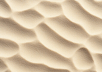 Poster - Aerial view of wind creating wavy pattern on sand dune background