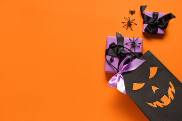 Sticker - Shopping bag with Halloween gift box and spiders on orange background