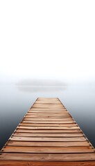 Poster - A weathered wooden pier extends out into a still, foggy lake, with trees displaying brilliant autumn colors lining the far shore.