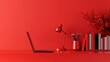 © Gefo - Modern red workspace with laptop, books, and desk lamp in study area