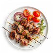 © Robert Kneschke - Top view of delicious grilled souvlaki skewers plated with vegetables
