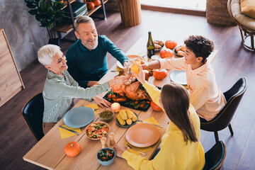 Poster - Above view portrait of big friendly family enjoy meal clink champagne juice glass celebrate thanksgiving day dinner flat indoors