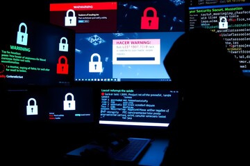 Poster - Amidst a chaotic array of cables and blinking LEDs, a hacker sits poised for action