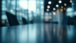 © gfx_yasir - A blurry view of a modern office space, with a table, chairs, and windows in the background