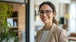 © sknab - Welcoming woman real estate agent inviting a prospective buyer to tour a beautifully staged modern home, showcasing her friendly and approachable persona