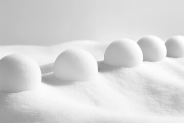 Wall Mural - White Snowballs Resting in a Blanket of Fresh Snow