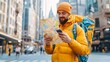 © Ratchadaporn - A blind or visually impaired traveler using a tactile map or innovative navigation app to independently explore and discover a new city